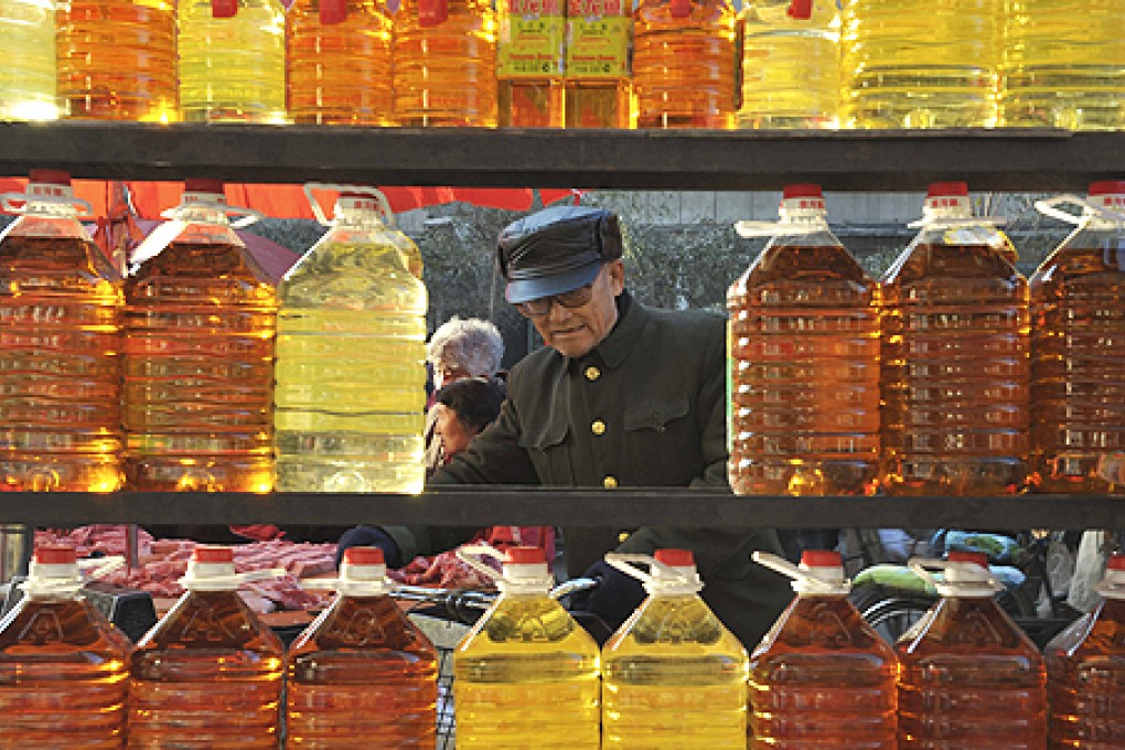 In Jiangsu 16 people have gone on trial accused of using waste from animal parts to make cooking oil. Photo: AP