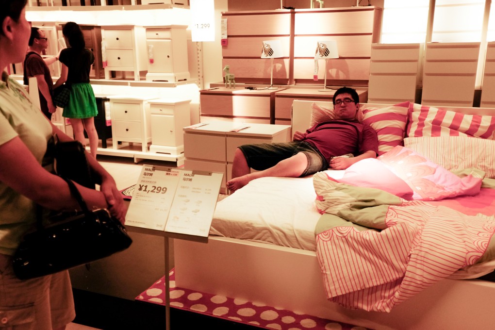 Beijing shoppers check out IKEA’s furniture. The company is sticking with its target of doubling sales to around 50 billion euros (HK$511.9 billion) by 2020. Photo: SCMP