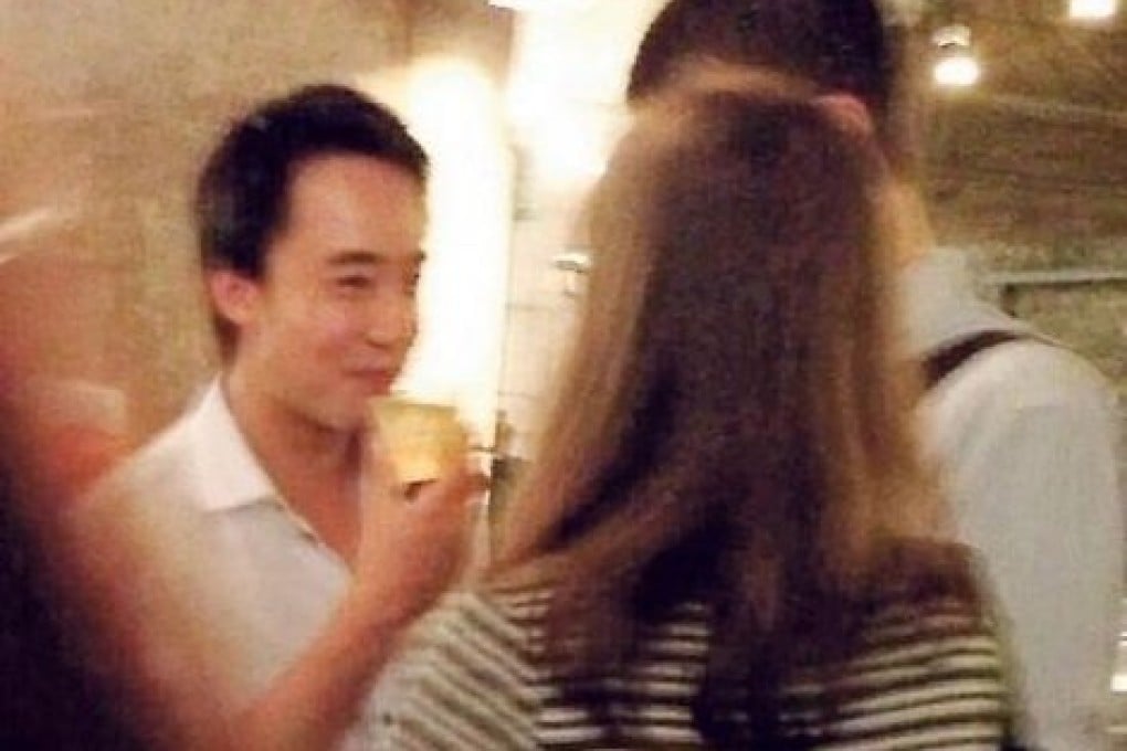 Bo Guagua is seen sipping from his drink while chatting with a few cohorts in a photo. Photo: screenshot via Weibo
