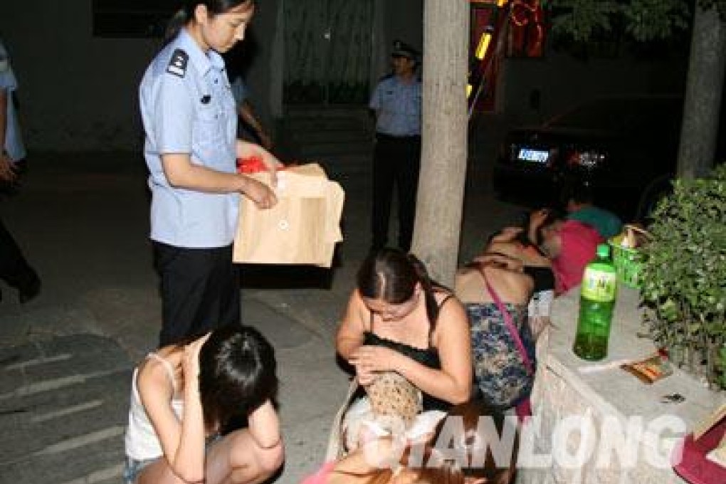The photo Beijing police shared of the raid on brothels in northern Beijing. Screenshot from Sina Weibo.
