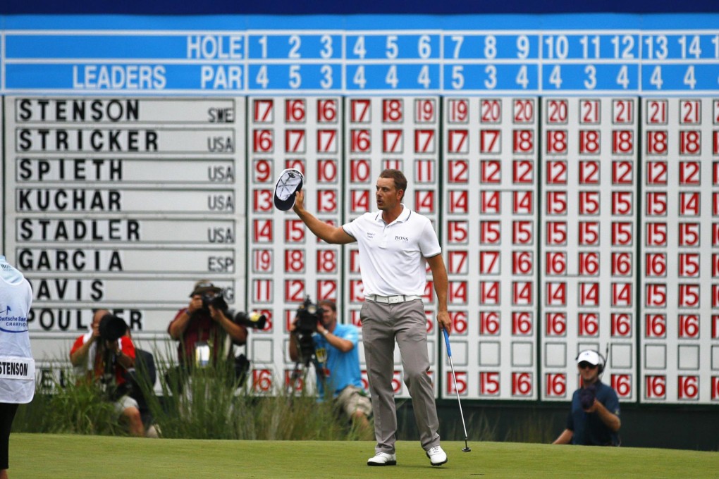 Henrik Stenson of Sweden salutes the crowd after winning the Deutsche Bank Championship with a 22-under 262. Photo: Reuters
