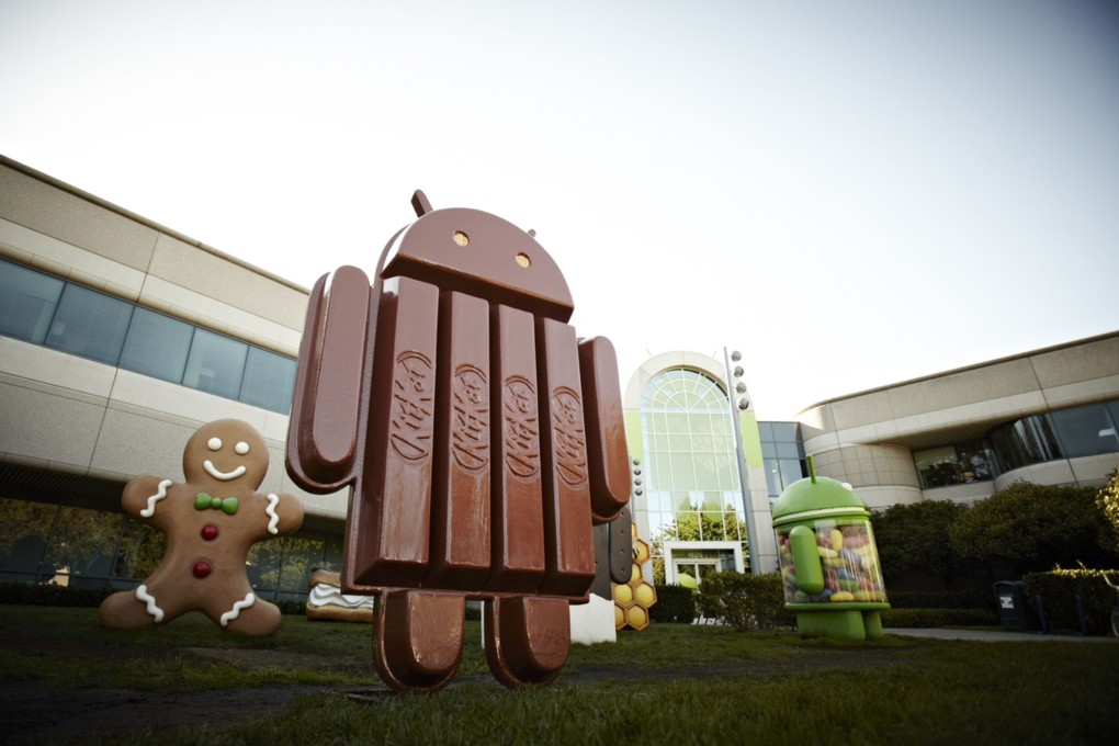 A chocolate version of the Android mascot made from KitKat bars stands in front of Google’s Mountain View headquarters on Wednesday. Google says its new mobile operating system will be called ‘KitKat’. Photo: AFP