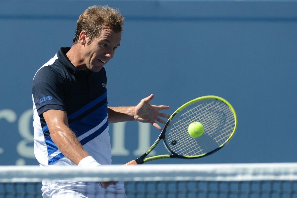Richard Gasquet in action against Spain's David Ferrer. Photo: Xinhua