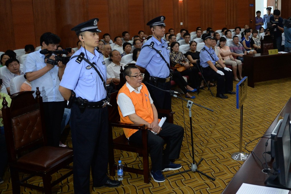Yang Dacai, the former director of the work safety bureau in Shaanxi province, stands his trial at the Xi'an Intermediate People's Court in Xi'an in northwest Shaanxi Province. Photo: AP