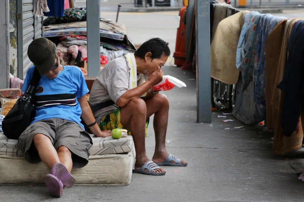 Homeless people gather in Sham Shui Po. Photo: Felix Wong