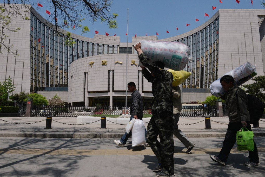 China's central bank says regulators must strengthen policy coordination to ward off potential financial risks. Photo: AFP