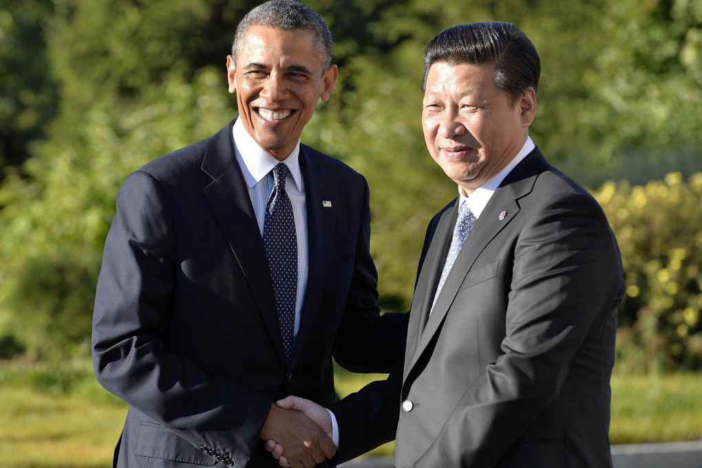 Barack Obama shakes hands with Xi Jinping. Photo: AFP