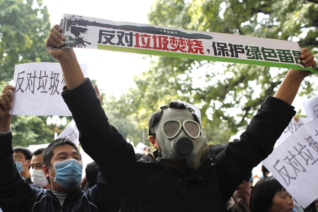 Guangdong police have arrested three activists, one of them a Hong Kong resident, for organising protests over a planned incinerator in Huizhou. Photo: AP