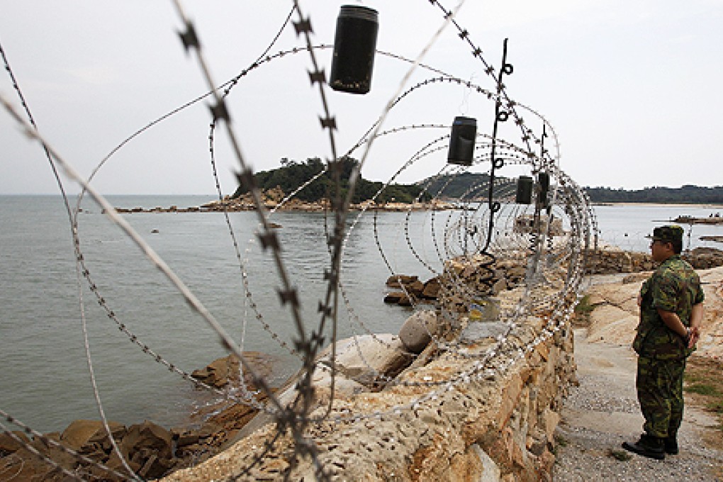A soldier stands guard at the Mashan observatory in Kinmen. Photo: Reuters