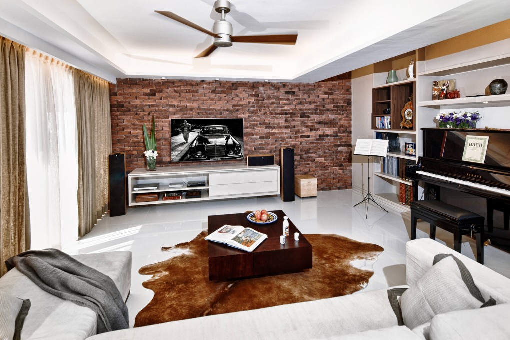 Living room: The ceiling fan cost HK$2,925 at Life’s A Breeze (16/F, Horizon Plaza, tel: 2572 4000). The curtains were HK$20,000 from Tak Yar Curtain & Decoration (29 Electric Road, Causeway Bay, tel: 2578 6316). The sofa, ottoman, coffee table, sake set and Spanish-style platter were all purchased years ago. The throw on the sofa was HK$859 from Indigo Living and the Koldby cowhide rug was HK$2,290 from Ikea (various locations; www.ikea.com.hk). The television unit was made by Ngai Keung Decoration (70 Ki Lung Street, Sham Shui Po, tel: 2309 2311) for HK$12,000. Ngai Keung also created the exposed brickwork (price on application).