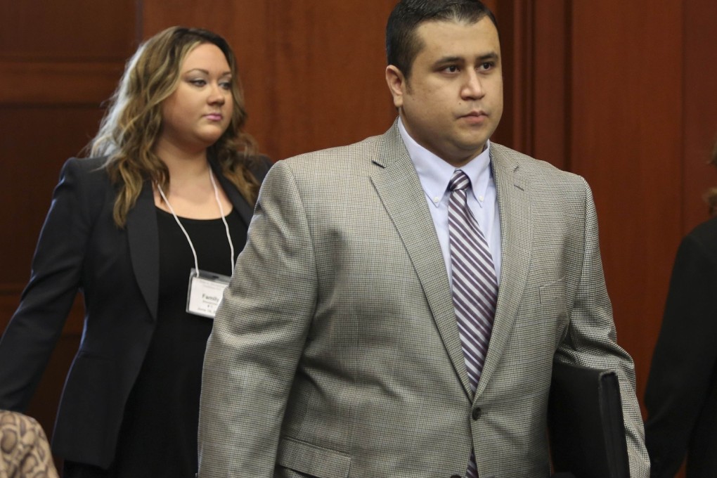 George Zimmerman, followed by his wife Shellie (left). Photo: Reuters