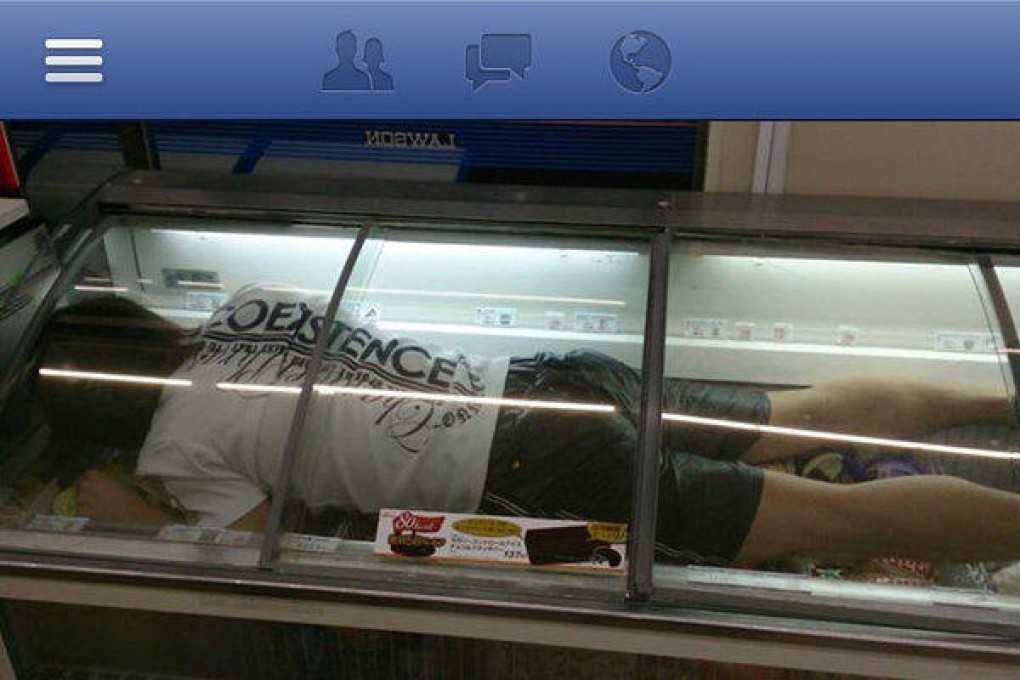 This Facebook photo of a worker in a convenience store's freezer led to the store operator losing his franchise. Photo: SCMP