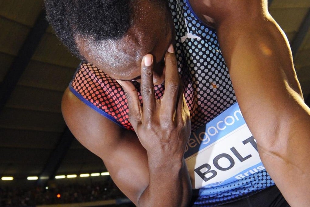 Usain Bolt celebrates after winning the 100m. Photo: AFP