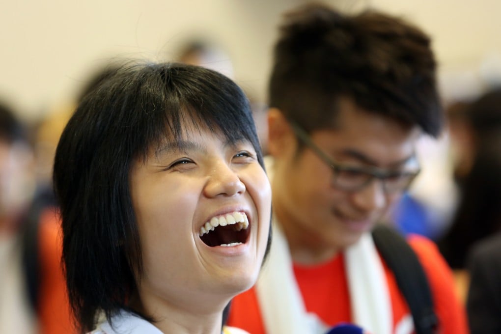 A deaf and blind student at Chinese University of Hong Kong. Communication by tactile signing is helping people with disabilities in Hong Kong. Photo: Sam Tsang