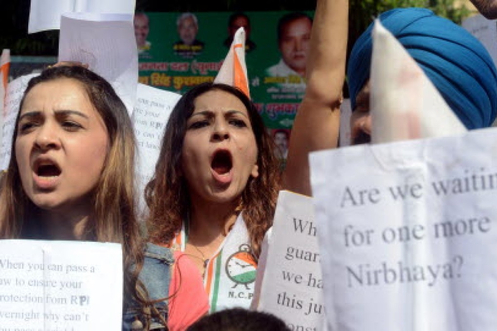 Indian activists demand an amendment of juvenile justice laws, after a juvenile in last year's Delhi gang rape was convicted and sentenced to three years. Photo: AFP