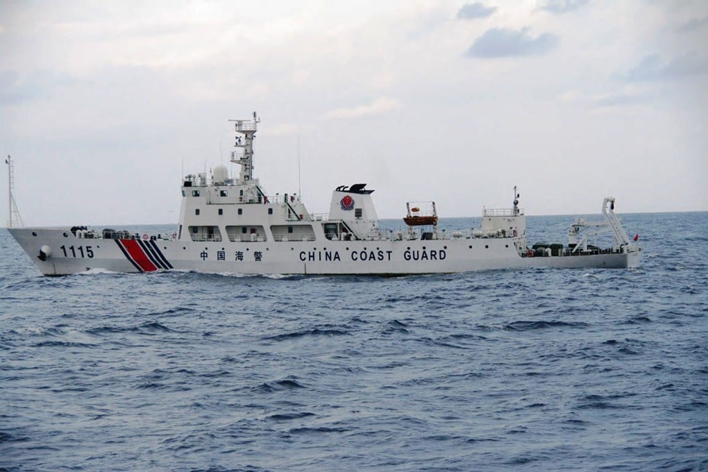 A handout picture taken and released by the Japan Coast Guard on September 5, 2013 shows a Chinese Coast Guard ship cruising near the disputed islets known as the Senkaku islands in Japan and Diaoyu islands in China. Photo: AFP