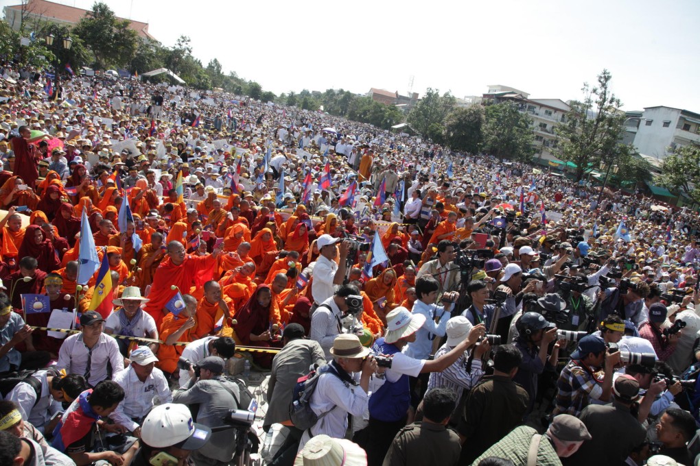 Thousands of opposition supporters rally at Freedom Park, Phnom Penh to protest against the results of Cambodia's election. Photo: Xinhua