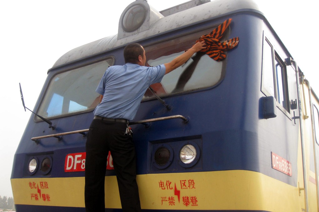 The driver goes through his preparations at the terminal in Zhengzhou before setting off on the freight service to Hamburg. Photo: Celine Sun