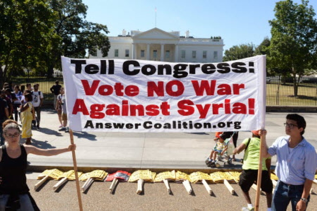 Demonstrators in the US protest against war on Syria.