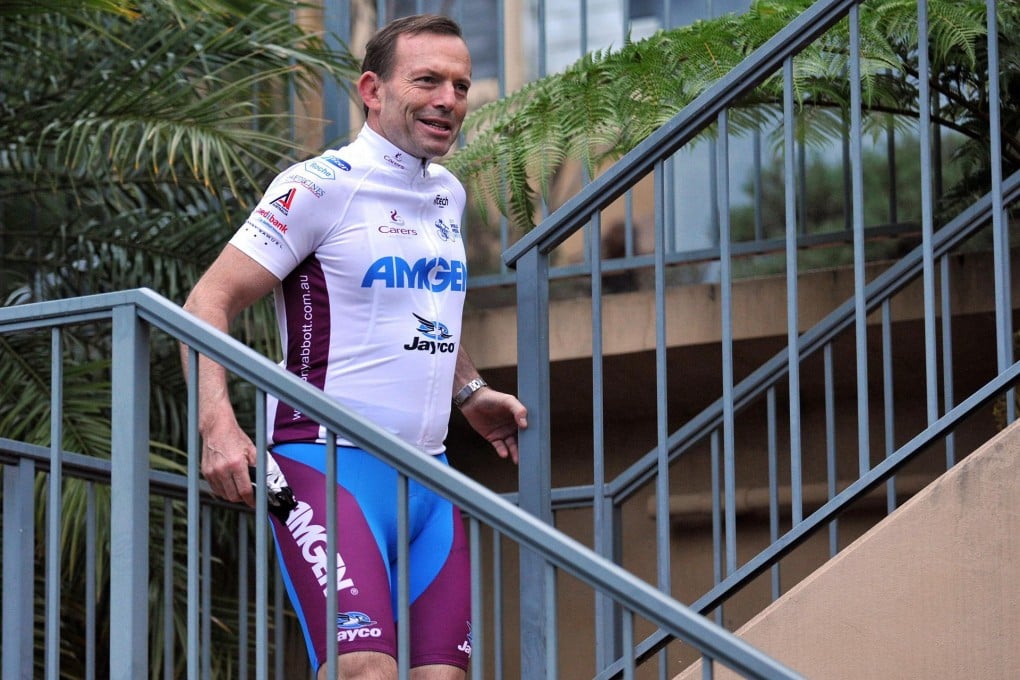 Prime Minister-elect Tony Abbott prepares for a morning bicycle ride in Sydney a day after the coalition's election victory. Photo: EPA