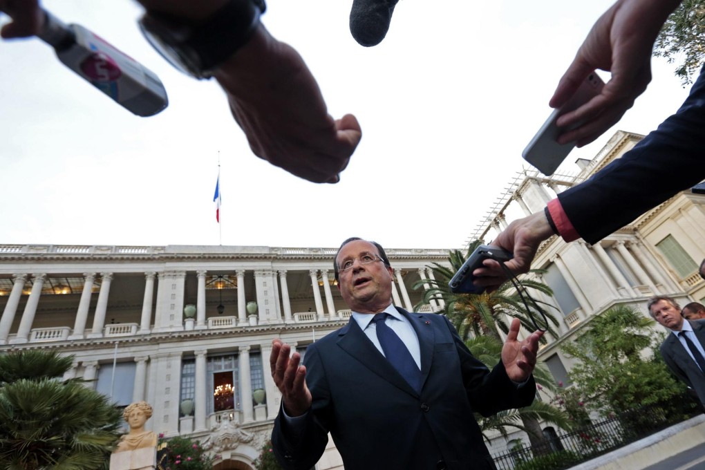 French President Francois Hollande faces the media. He is battling criticism for aligning with the US over plans to attack Syria. Photo: Reuters