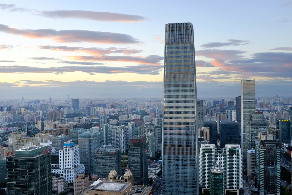 The China World Trade Center Tower III and other buildings are seen in Beijing's central business district August 29, 2013. Photo: Reuters