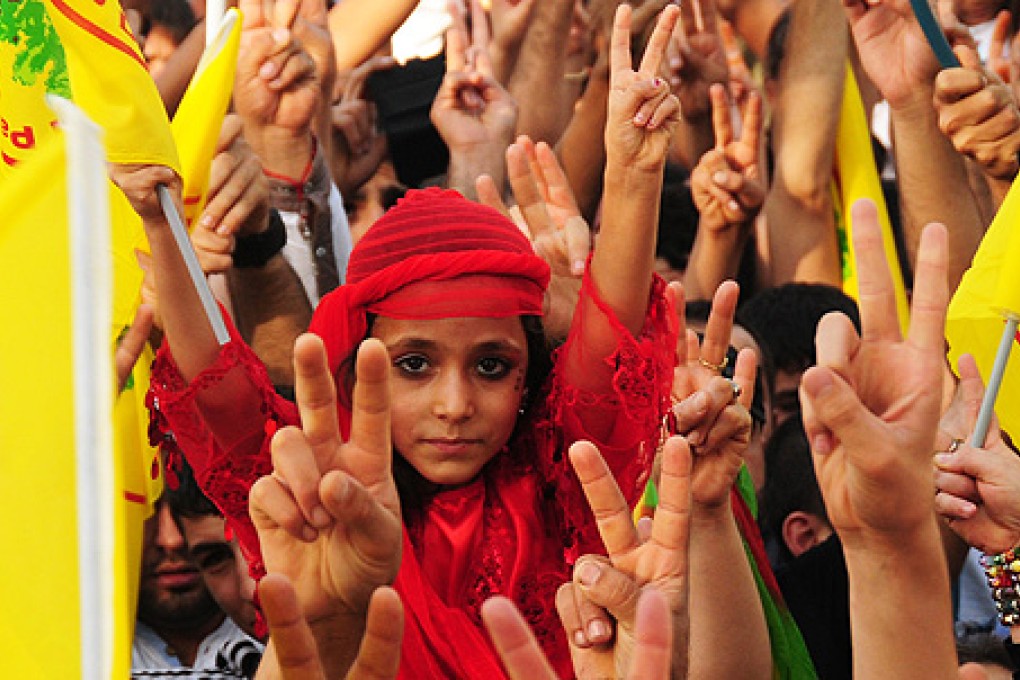 A young Kurdish girl joins a demonstration in Diyarbakir, southeast Turkey, on September 1. Photo: AFP