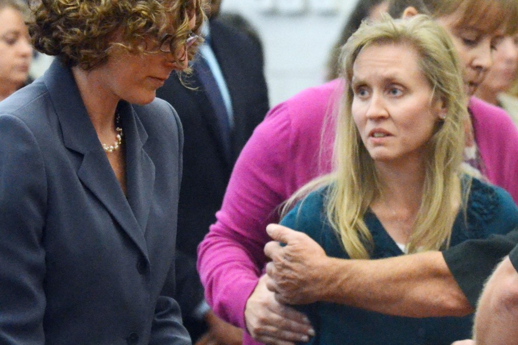 Carri Williams is taken into custody. During her seven-week trial, she was tearful and defiant under cross-examination. Photo: AP