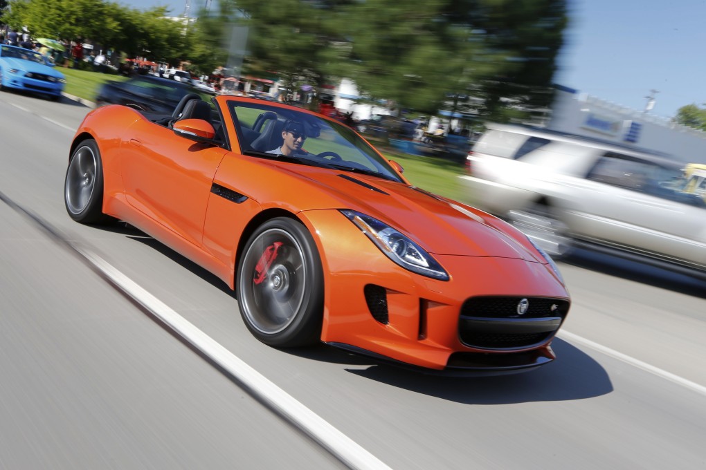 A 2014 Jaguar F Type. The company plans to create 1,700 jobs at a UK plant in Solihull as part of a 1.5 billion pound (HK$18.2 billion) investment to expand its range of sports cars. Photo: AFP