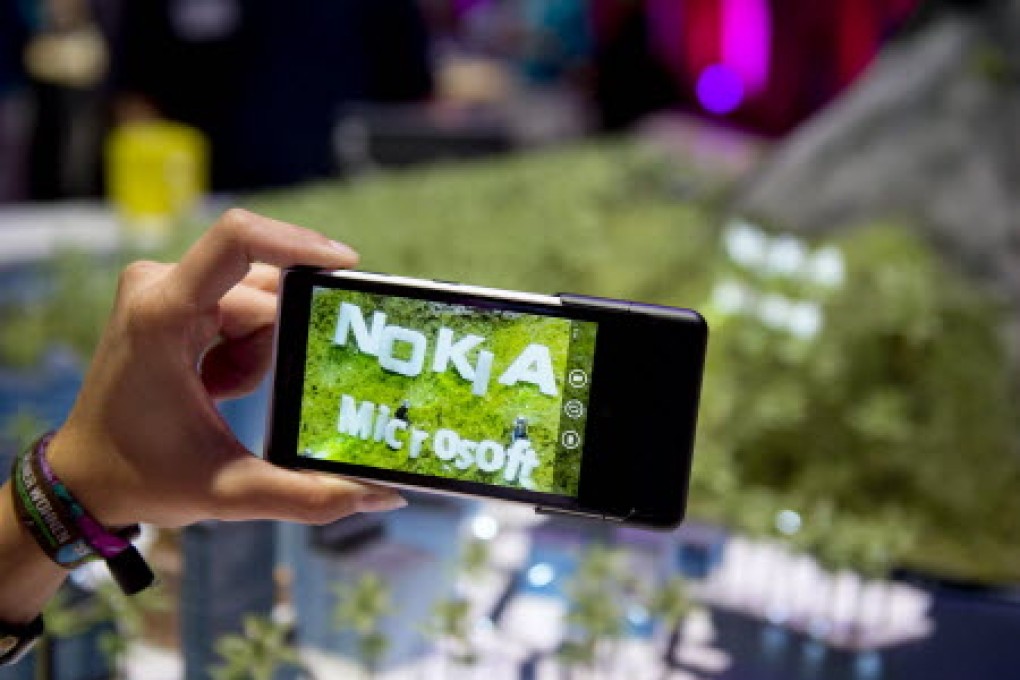 The Microsoft-Nokia marriage is too late as emerging market of mobile industry is shifting to Asia. Photo: AFP