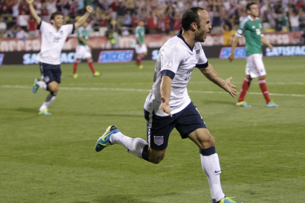 Landon Donovan celebrates his goal against Mexico. Photo: AP