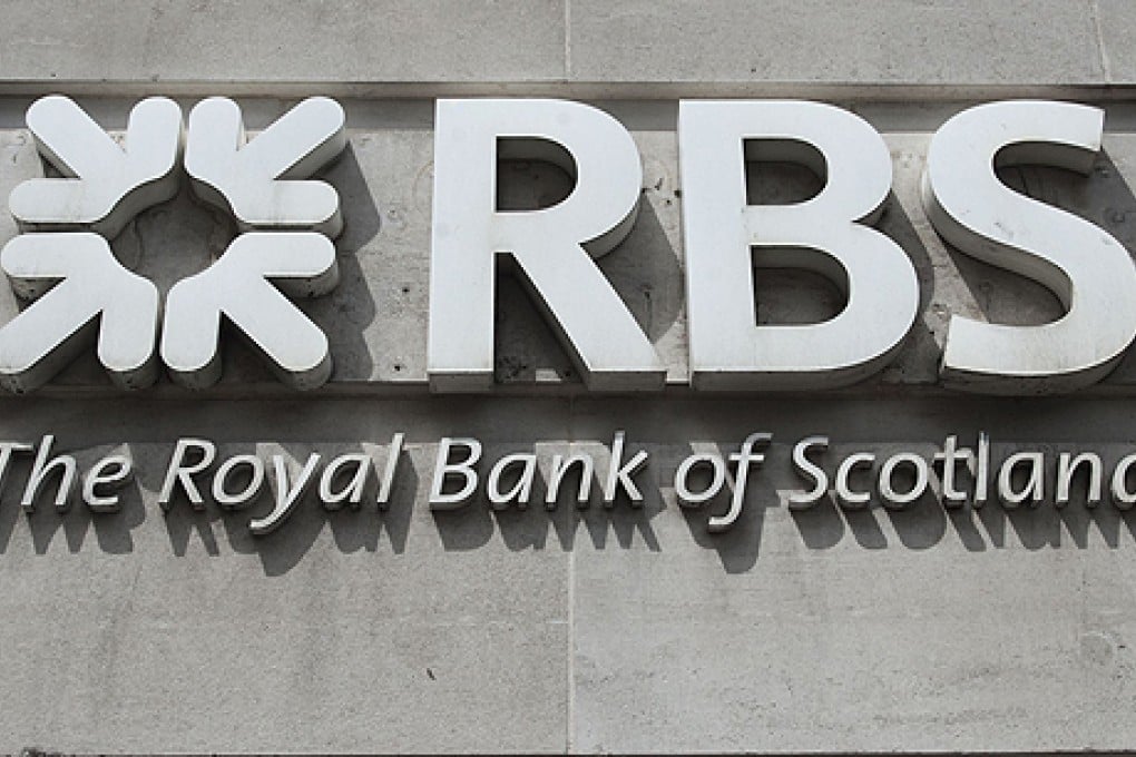 A former bank manager was jailed on Wednesday for four years for illegally transferring HK$28 million from the accounts of her clients at the Royal Bank of Scotland. Photo: AFP