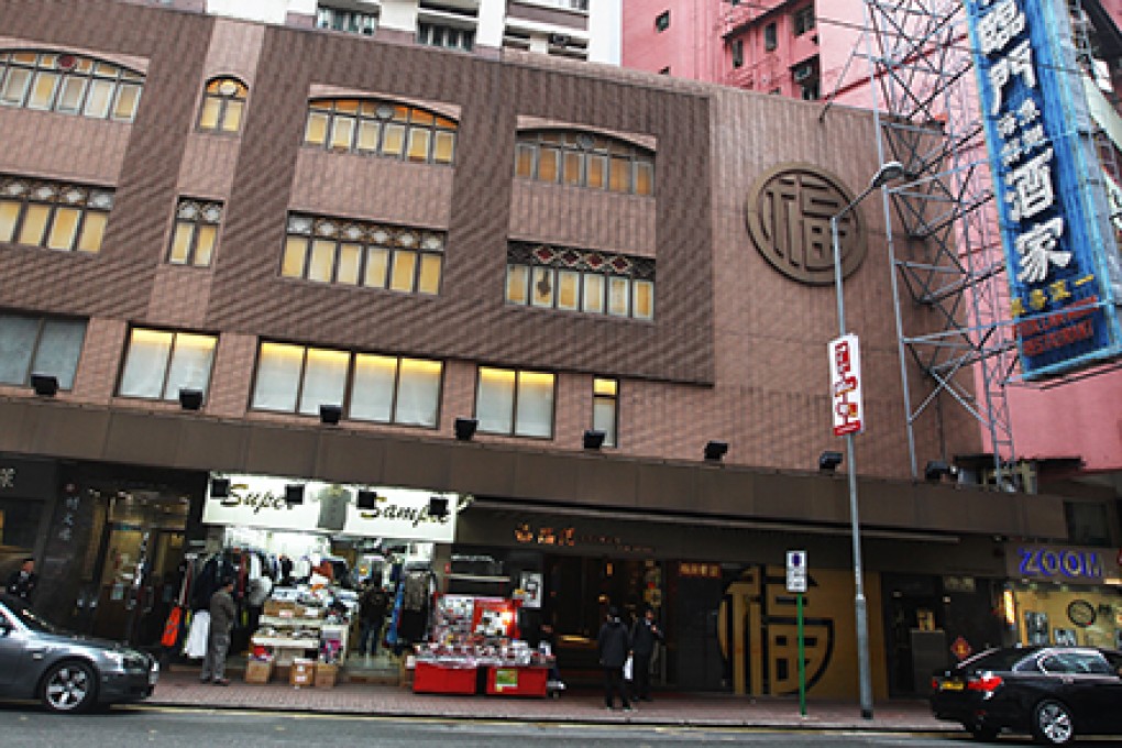 An external view of the Fook Lam Moon Restaurant in Wan Chai. One of the restaurant chain's owners has now opened a new eatery nearby. Photo:  Sam Tsang.