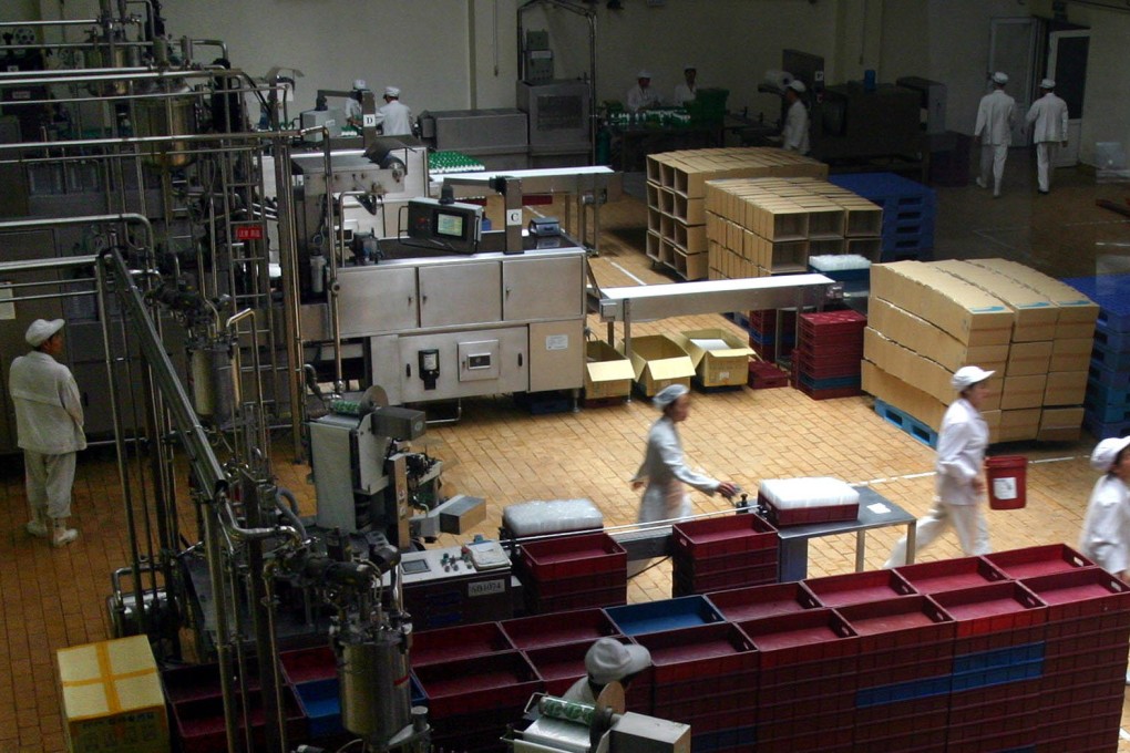 A Huishan Dairy production line in Shenyang, Liaoning. Its output of raw milk reached two million tonnes last year. Photo: Imaginechina