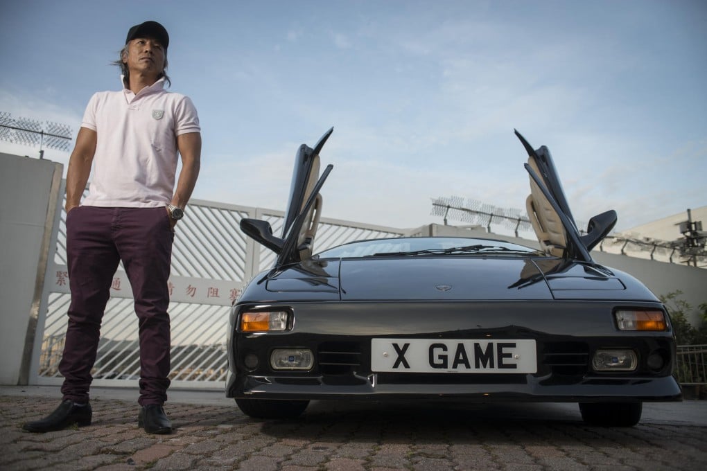 Ken Choi, owner of the company X Game, stands next to his Lamborghini Diablo VT Roadster. Photos: Antony Dickson, Mia Rasborn Nora Tam