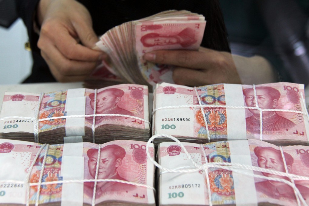 The yuan is expected to make a smaller gain this year. Photo: Xinhua