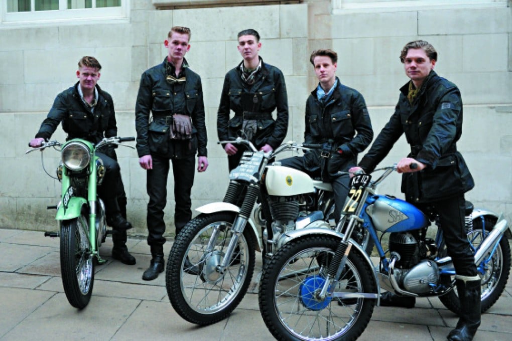 Racers in Belstaff jackets with classic motorcycles from the 1950s and 60s