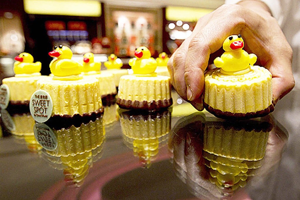 Creative mooncakes such as these mango ones with yellow ducks on the top are proving a popular alternative to the traditional Mid-Autumn Festival treats. Photo: Simon Song