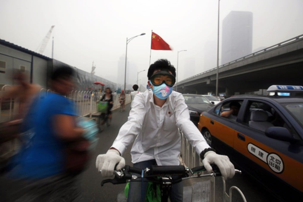 Beijing is one of three cities being asked to reduce levels of the tiny airborne pollutants that are a major cause of smog. Photo: EPA