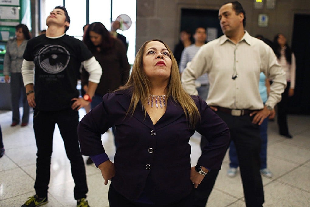 Mexico City's local government employees participate in a mandatory physical activity session. Photo: Reuters