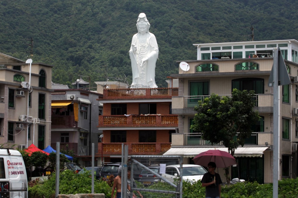 As the giant Goddess of Mercy statue nears completion, locals worry about visitor hordes. Photo: Nora Tam