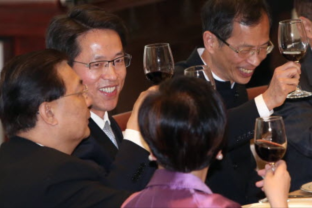Zhang Xiaoming (second left) has shot down Civic Party's proposal for an open nomination for the chief executive in 2017's election.