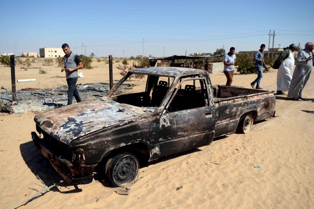 Wreckage of a burnt car in the security-lacking Sinai. Photo: AFP