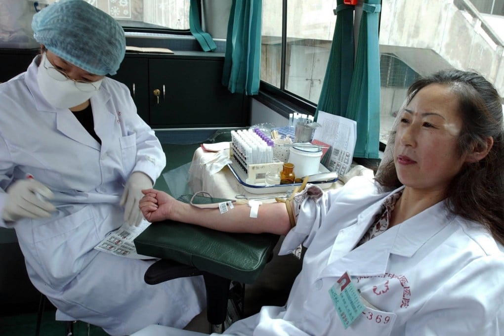 A woman donates blood in China. The Peking University Cancer Hospital says it needs virgin blood for medical research. Photo: Xinhua