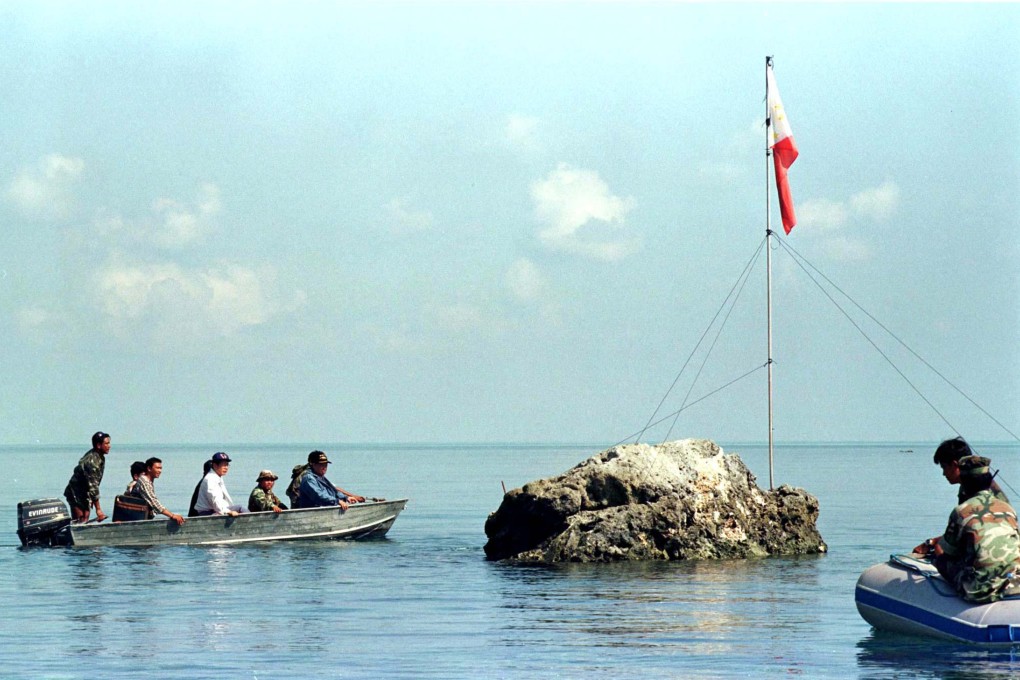 A team of Philippine navy and congressional leaders sail to Scarborough shoal in the South China Sea. Photo: Reuters