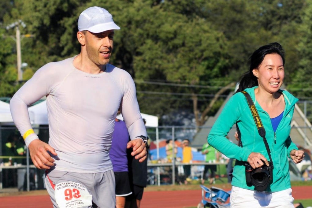 Andre Blumberg is joined by his wife Patchanida Pongsubkarun as he approaches the finish line of the Western States 100. Photos: Patchanida Pongsubkarun