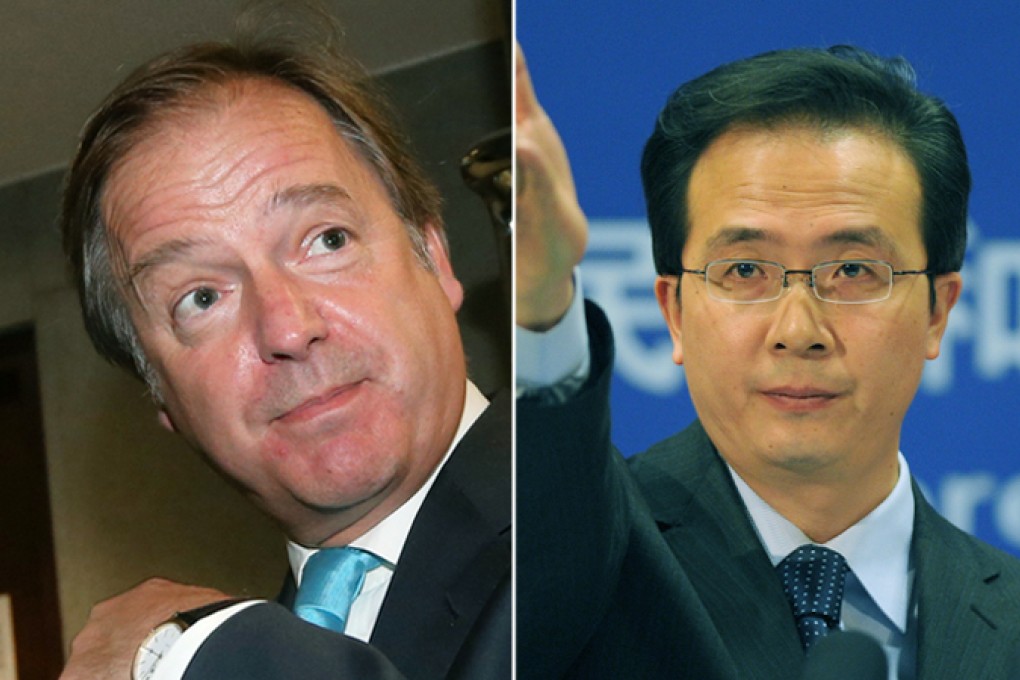 Foreign Ministry spokesman Hong Lei and Hugo Swire
