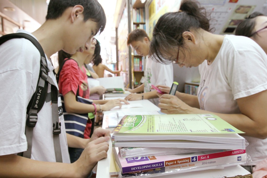 Students surround a book shop to buying the Secondary School textbook