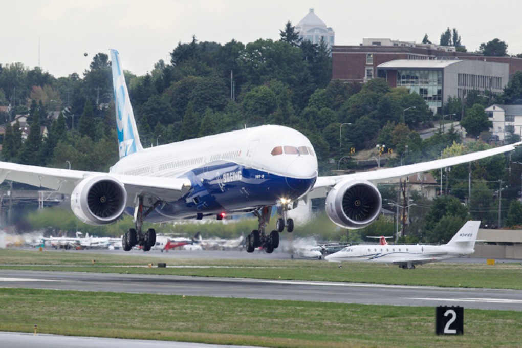 Boeing’s 787-9, which made its maiden flight on Tuesday, has room for 290 passengers, 40 more than the original 787-8 jetliner, and has about 300 more nautical miles of range.  Photo: AFP