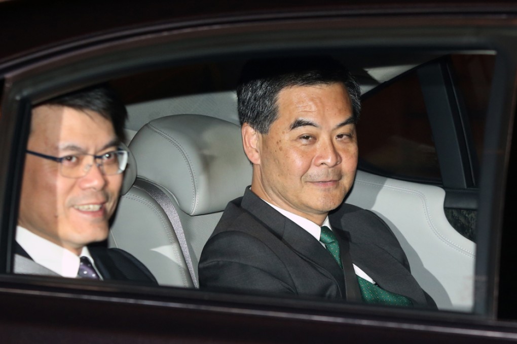 Edward Yau Tang-wah (left), Director of Chief Executive's Office accompanies Chief Executive Leung Chun-ying to a dinner with different members of the society at Government House. Photo: Sam Tsang